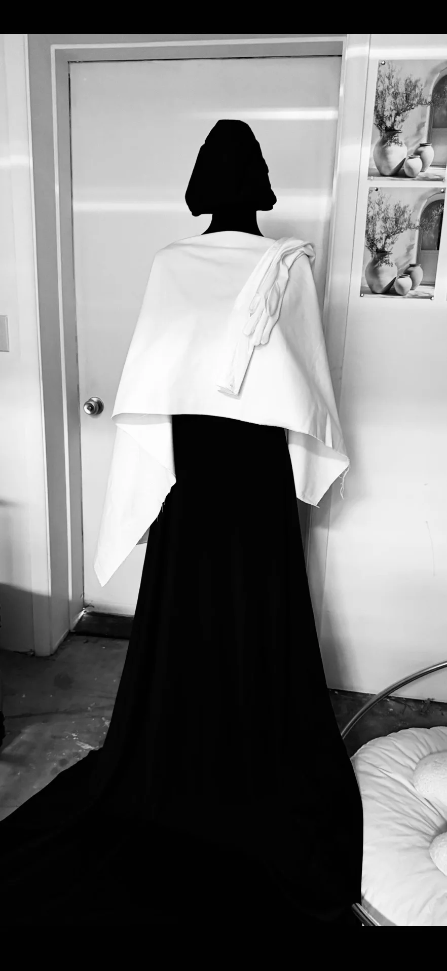 Behind-the-scenes view of a portrait setup in black and white