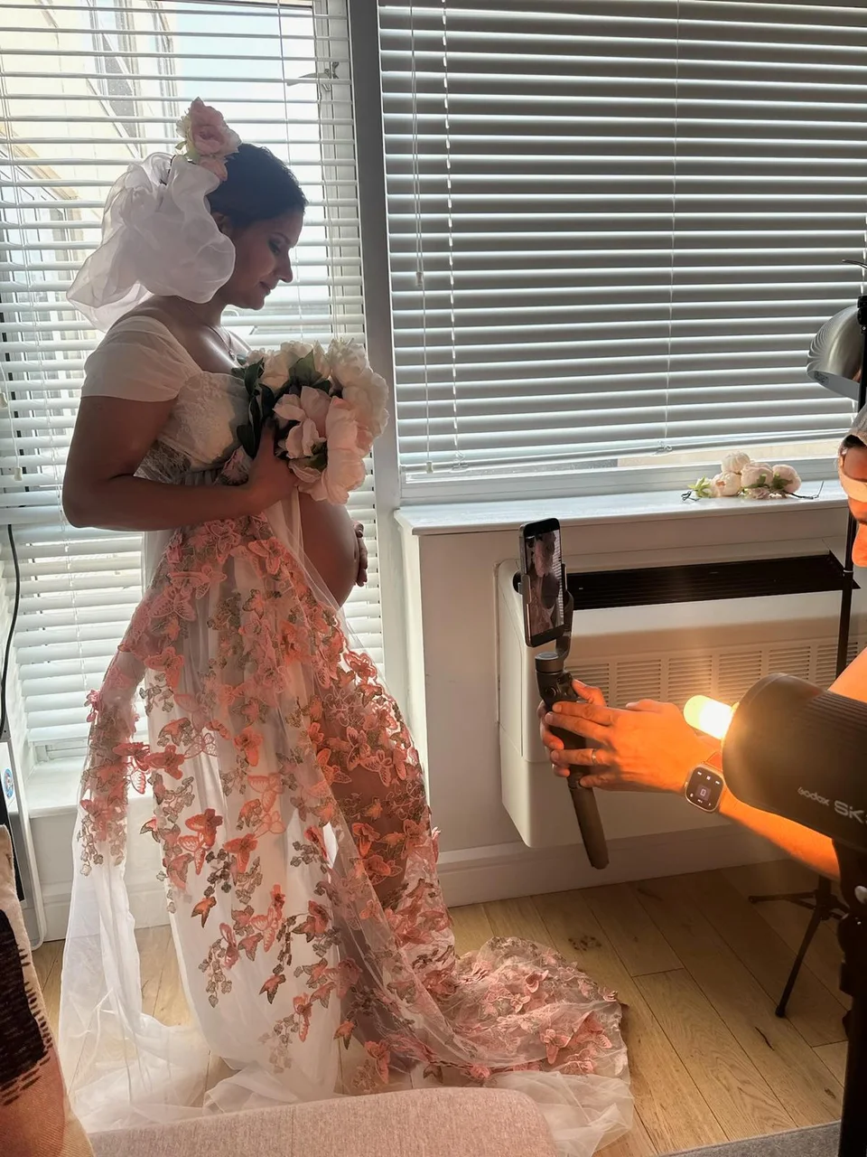 Portrait session with floral styling and portable lighting