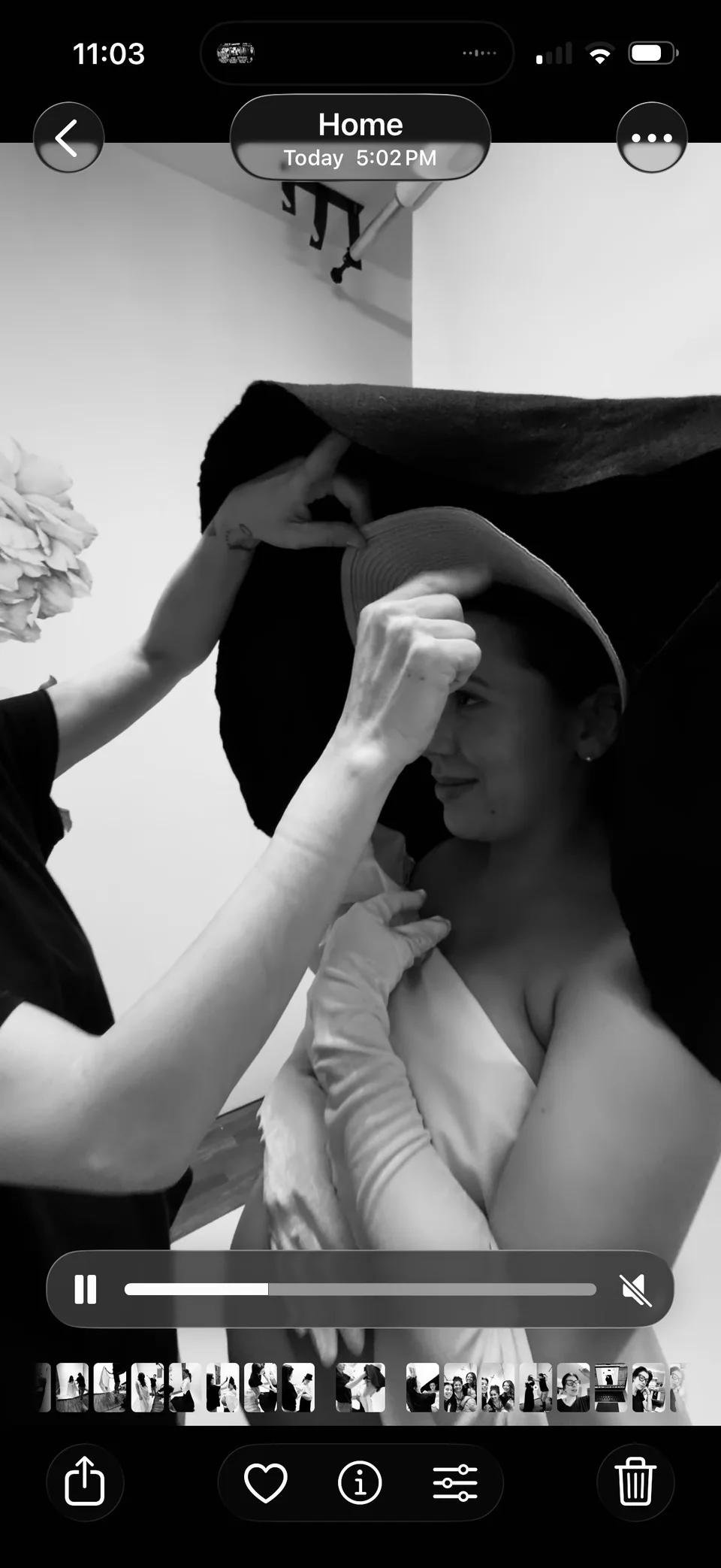 Close-up of styling adjustments during a photo session