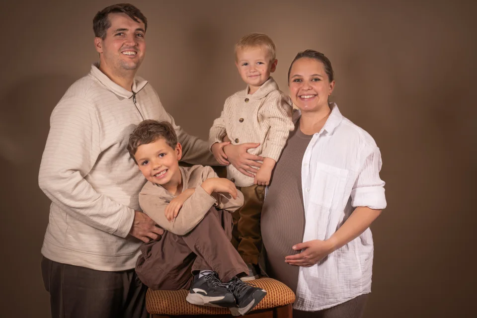 Family portrait with parents and two young children